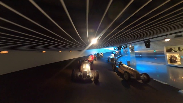 Video Reference: Automotive lighting, Wheel, Automotive design, Electricity, Tire, Road, Vehicle, Tunnel, Electric blue, Space