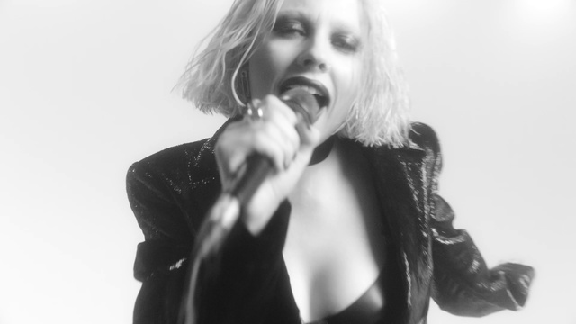 Video Reference: Microphone, Lip, Eye, Black, Musician, Entertainment, Gesture, Style, Music, Black-and-white