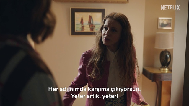 Video Reference: Hairstyle, Picture frame, Sleeve, Gesture, Waist, Kitchen appliance, Happy, Fun, Long hair, Fashion design