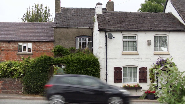 Video Reference: Wheel, Tire, Plant, Car, Vehicle, Property, Building, Window, Sky, House