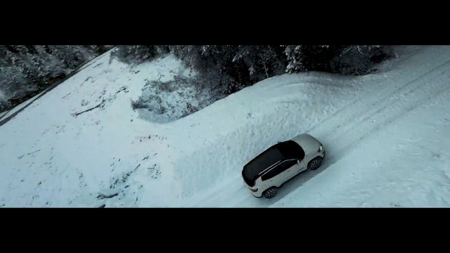 Video Reference: aerial, car, snow, winter, road, vehicle, forest, landscape, top view, driving, outdoors, frozen, travel