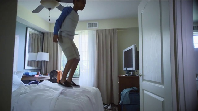 Video Reference: Furniture, Comfort, Shorts, Textile, Wood, Interior design, Floor, Television, Home appliance, Hardwood