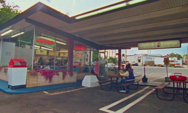 Video Reference: Building, Shade, Sky, Plant, Tree, Leisure, House, City, Gas, Filling station