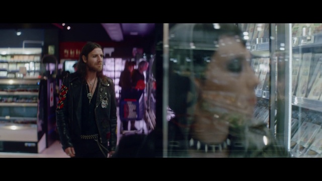 Video Reference: Sleeve, Leather jacket, Fashion design, Event, Display case, Fun, Electric blue, Retail, Magenta, Glass