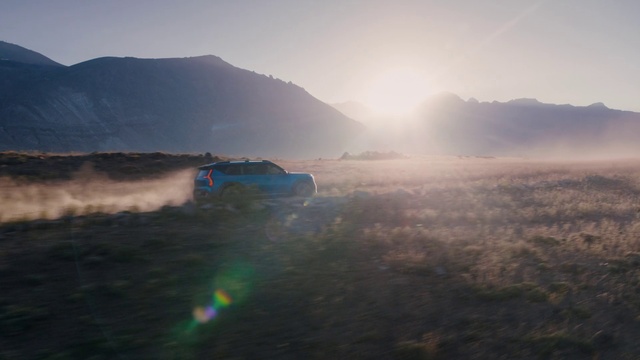 Video Reference: Cloud, Sky, Atmosphere, Mountain, Highland, Sunlight, Vehicle, Sunrise, Sunset, Terrain