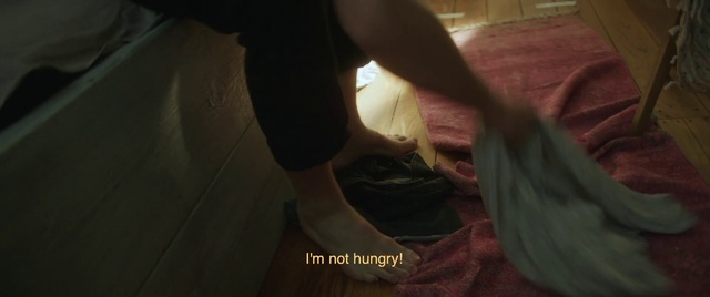 Video Reference: Gesture, Thigh, Elbow, Knee, Wood, Tints and shades, Wrist, Flooring, Human leg, Foot