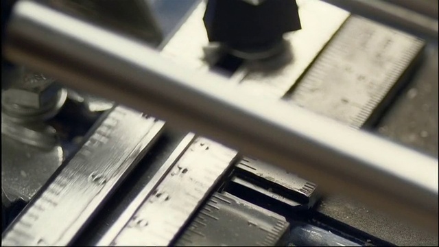 Video Reference: Musical instrument accessory, Font, Parallel, Typesetting, Office equipment, Monochrome photography, Metal, Musical instrument, Monochrome, Electronic instrument