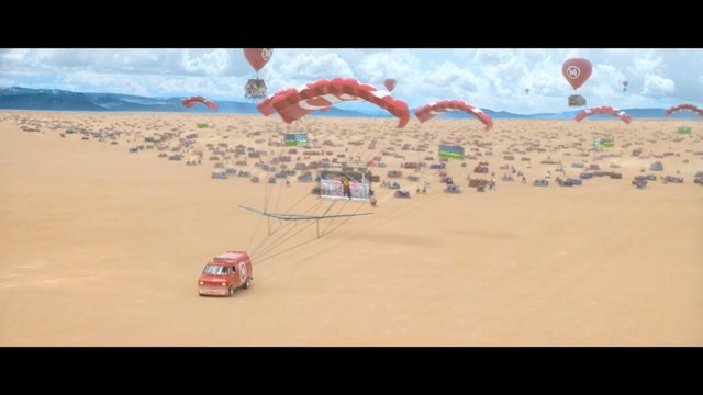 Video Reference: desert, parachutes, vehicles, wide shot, sky, clouds, landscape, sci-fi, competition, aerial, crowd, sand, horizon, motion, game scene, surreal