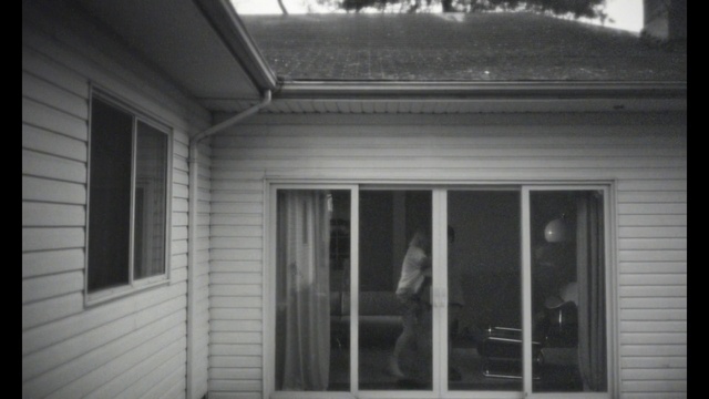 Video Reference: Window, Building, Fixture, Wood, Grey, Style, Black-and-white, Siding, Door, Facade