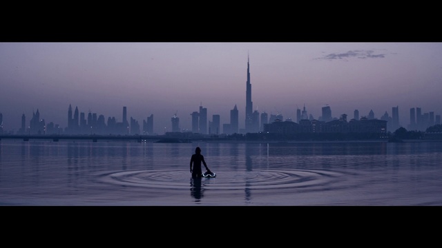 Video Reference: Water, Building, Skyscraper, Sky, Bicycle, World, Tower, Tower block, Dusk, Atmospheric phenomenon