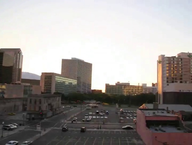 Video Reference: Sky, Building, Skyscraper, Tower block, Vehicle, Urban design, Window, Condominium, Neighbourhood, Cityscape