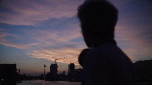 Video Reference: Cloud, Sky, Atmosphere, Water, Building, Gesture, Afterglow, Dusk, Atmospheric phenomenon, Skyscraper