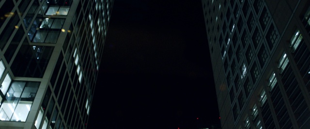 Video Reference: Building, Skyscraper, Light, Black, Condominium, Tower block, Cityscape, Commercial building, Facade, Tints and shades