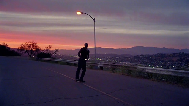 Video Reference: Cloud, Sky, Street light, Road surface, Asphalt, Tree, Plant, Atmospheric phenomenon, Dusk, Rolling