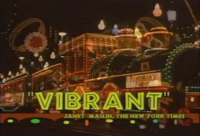 Video Reference: Building, Entertainment, Font, Midnight, Event, Recreation, Darkness, Wheel, Motor vehicle, Night