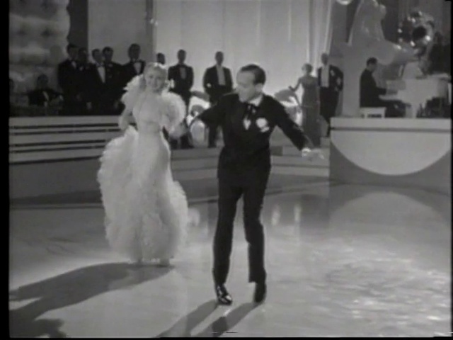 Video Reference: Flash photography, Dance, Black-and-white, Gesture, Happy, Style, Dress, Entertainment, Performing arts, Fun