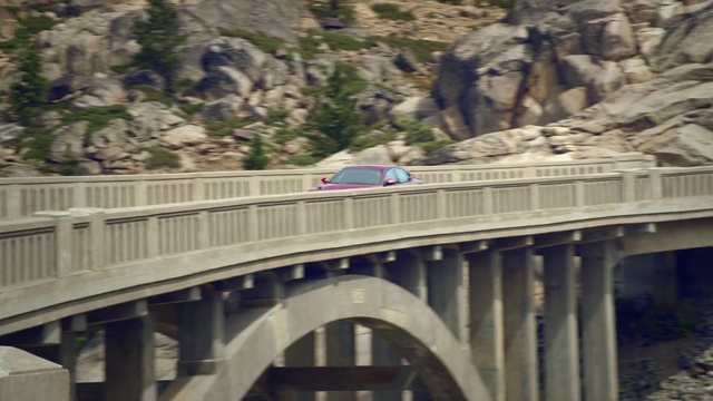 Video Reference: Mountain, Infrastructure, Vehicle, Fence, Building, Mode of transport, Thoroughfare, Bridge, Line, Wall