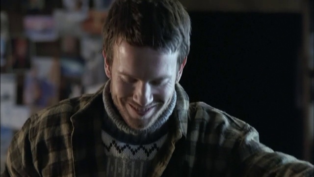 Video Reference: Smile, Flash photography, Neck, Jaw, Beard, Sleeve, Grey, Facial hair, T-shirt, Event