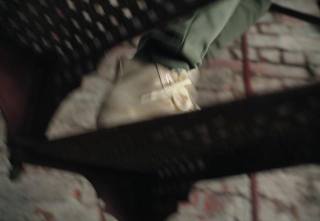 Video Reference: Grey, Automotive tire, Tints and shades, Comfort, Wood, Human leg, Auto part, Darkness, Carmine, Bumper