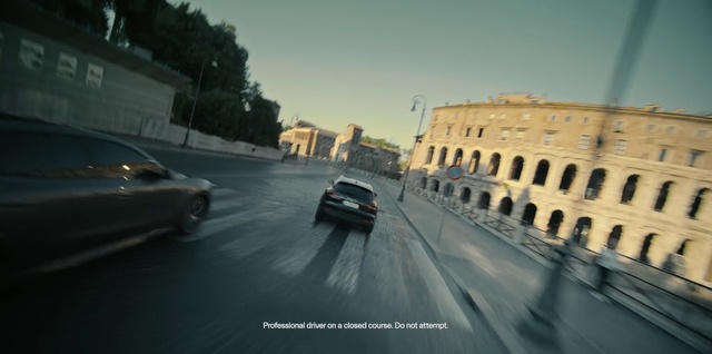 Video Reference: Sky, Tire, Car, Vehicle, Wheel, Building, Road surface, Automotive lighting, Asphalt, Automotive tire