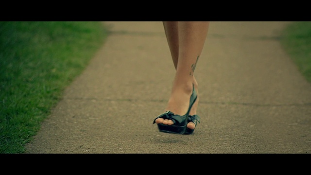 Video Reference: Road surface, Asphalt, People in nature, Knee, Wood, Flooring, Calf, Plant, Street fashion, Grass