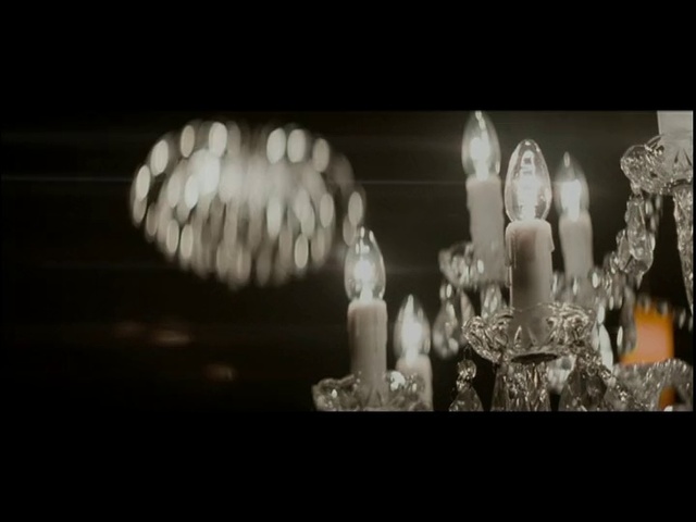 Video Reference: Art, Gas, Font, Event, Darkness, Ceiling fixture, Light bulb, Fashion accessory, Monochrome photography, Light fixture