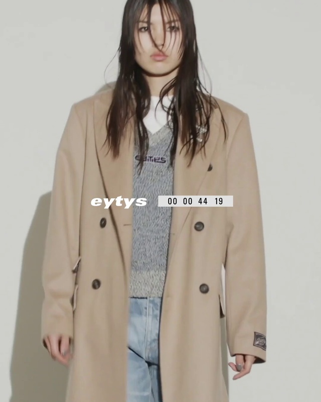 Video Reference: Outerwear, Overcoat, Dress shirt, Coat, Neck, Sleeve, Street fashion, Grey, Collar, Jacket