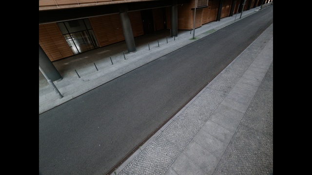 Video Reference: Building, Road surface, Asphalt, Flooring, Floor, Composite material, Wood, Sidewalk, Tints and shades, Urban design