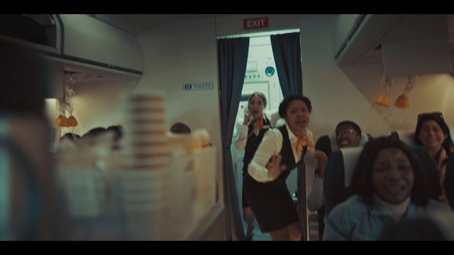 Video Reference: Flash photography, Font, Art, Event, Fun, Visual arts, Room, Display device, T-shirt, Conversation