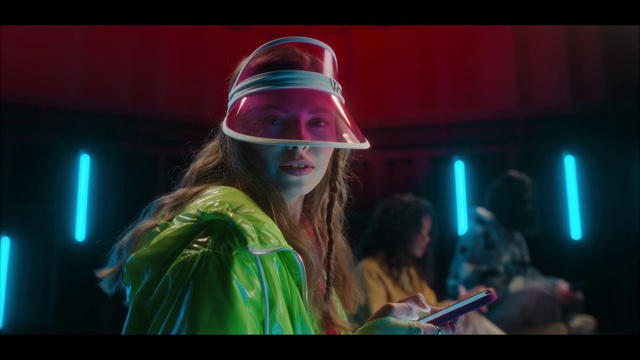 Video Reference: Lip, Hat, Entertainment, Sun hat, Fun, Music artist, Artist, Performing arts, Flash photography, Music