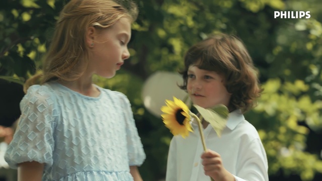 Video Reference: Hair, Flower, Hairstyle, Outerwear, Plant, People in nature, Organ, Botany, Happy, Petal