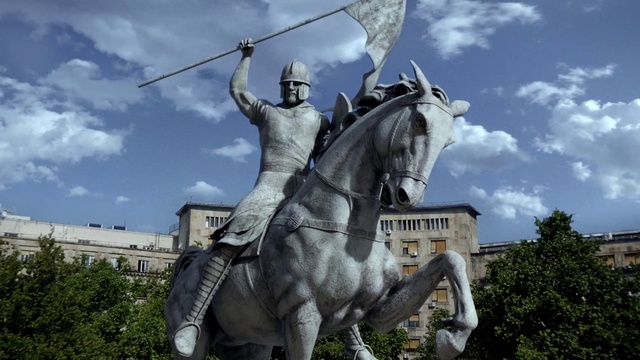 Video Reference: Horse, Cloud, Sky, Plant, Sculpture, Statue, Working animal, Horse tack, Bridle, Tree