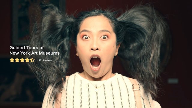 Video Reference: woman, surprised, hair flying, portrait, dark background, text overlay, star rating, reviews, tour, museum, art, New York, advertisement, close-up