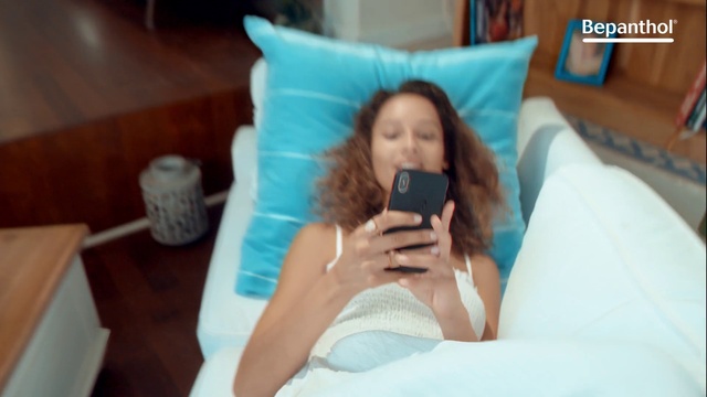 Video Reference: Furniture, Smile, Comfort, Gesture, Tableware, Couch, Leisure, Gadget, Pillow, Linens