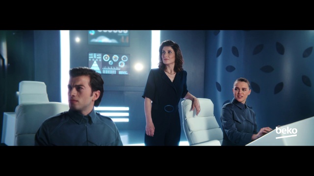 Video Reference: Coat, Television program, Gadget, Technology, White-collar worker, Font, Event, Display device, Fun, Entertainment