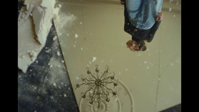 Video Reference: Human leg, Event, Art, Foot, Glass, Flooring, Transparent material, Denim, Visual arts, Thigh
