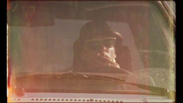 Video Reference: Head, Glasses, Window, Automotive lighting, Hood, Automotive mirror, Car, Vehicle, Motor vehicle, Eyewear