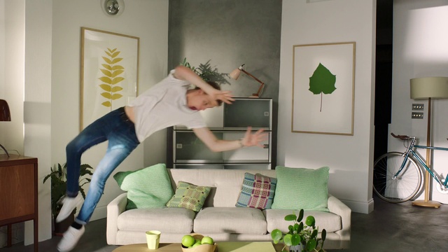 Video Reference: Couch, Table, Furniture, Green, Bicycle, Bicycle wheel, Comfort, Interior design, studio couch, Picture frame