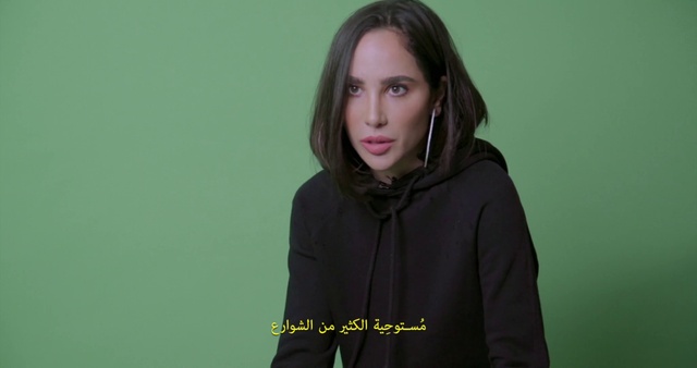 Video Reference: Cheek, Hairstyle, Facial expression, Flash photography, Sleeve, Gesture, Happy, Fashion design, Electric blue, Layered hair