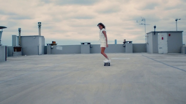 Video Reference: Sky, Cloud, Sports equipment, Asphalt, Skateboard, Rolling, Skateboarder, Ball, Recreation, Skateboarding Equipment