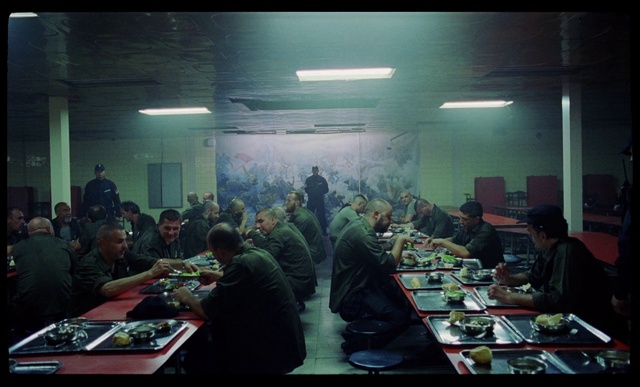 Video Reference: Table, Chair, Jacket, Event, Crowd, Indoor games and sports, Suit, Room, Non-commissioned officer, Job