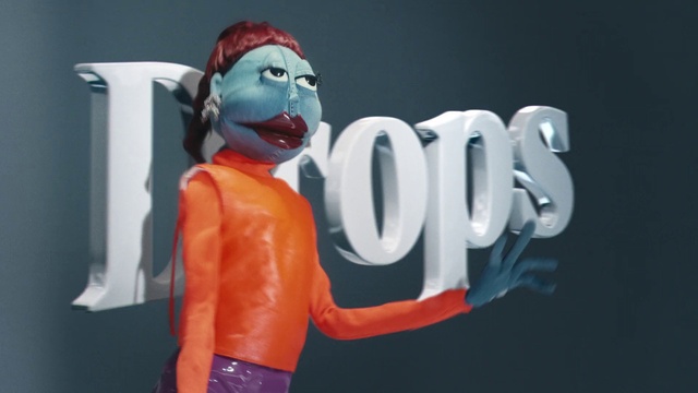 Video Reference: Outerwear, Sleeve, Gesture, Entertainment, Art, Event, Fun, Performing arts, Electric blue, Fashion design