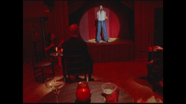 Video Reference: Chair, Curtain, Entertainment, Red, Theater curtain, Event, Performing arts, Suit, Music venue, Fun