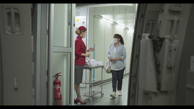 Video Reference: Standing, Fixture, Fire extinguisher, Fashion design, Event, Door, Engineering, Room, Machine, Job