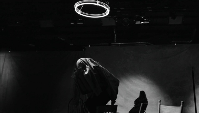 Video Reference: White, Light, Black, Flash photography, Standing, Entertainment, Black-and-white, Musician, Style, Audio equipment