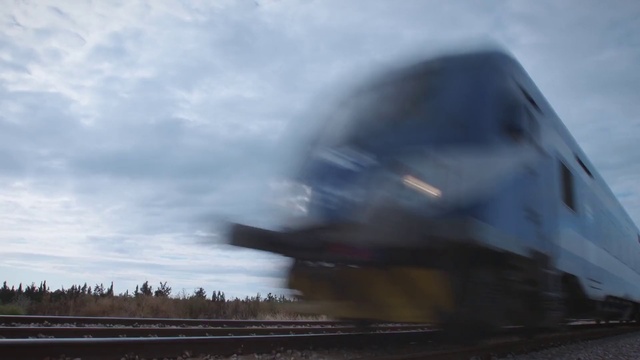 Video Reference: Cloud, Train, Sky, Rolling stock, Track, Automotive lighting, Railway, Rolling, Railroad car, Cumulus