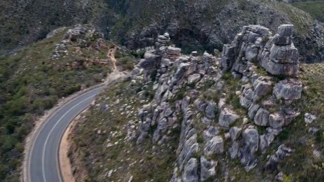 Video Reference: Mountain, Bedrock, Terrain, Landscape, Slope, Geological phenomenon, Formation, Outcrop, Mountain range, Fault