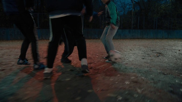 Video Reference: Shorts, Gesture, Leisure, Recreation, Football, Asphalt, Road surface, Grass, Thigh, Soccer