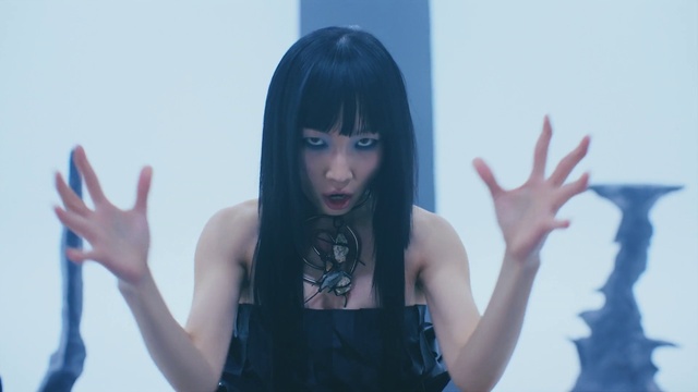 Video Reference: Hand, Hairstyle, Shoulder, Arm, Azure, Human body, Flash photography, Purple, Eyelash, Finger