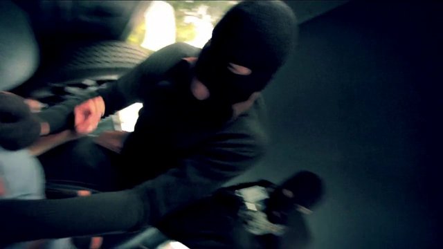 Video Reference: masked people, indoor, close-up, blurred, dim lighting, struggle, suspicious, dark clothing, action, low light, faces covered, motion blur